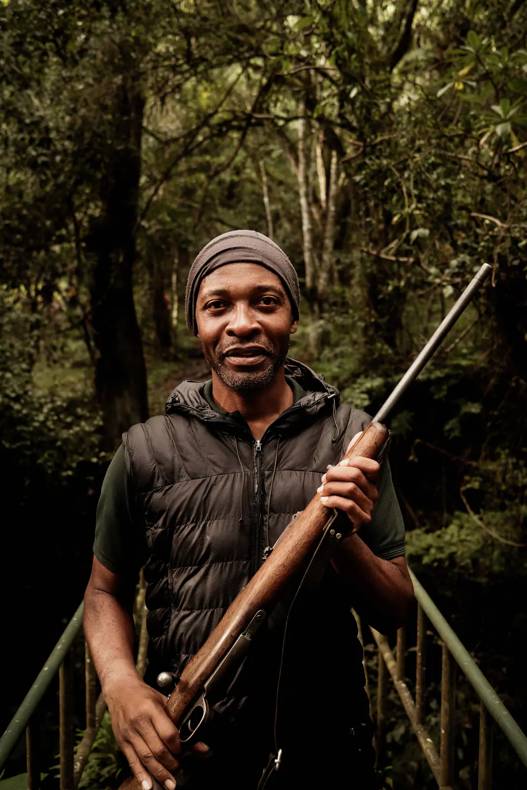 A park ranger at the forest trailhead